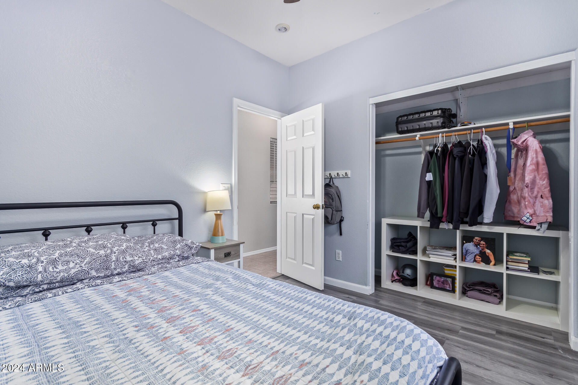 18750 East Ryan Road Queen Creek, AZ 85142 - Photo 25 of 36 a bedroom with a bed and closet