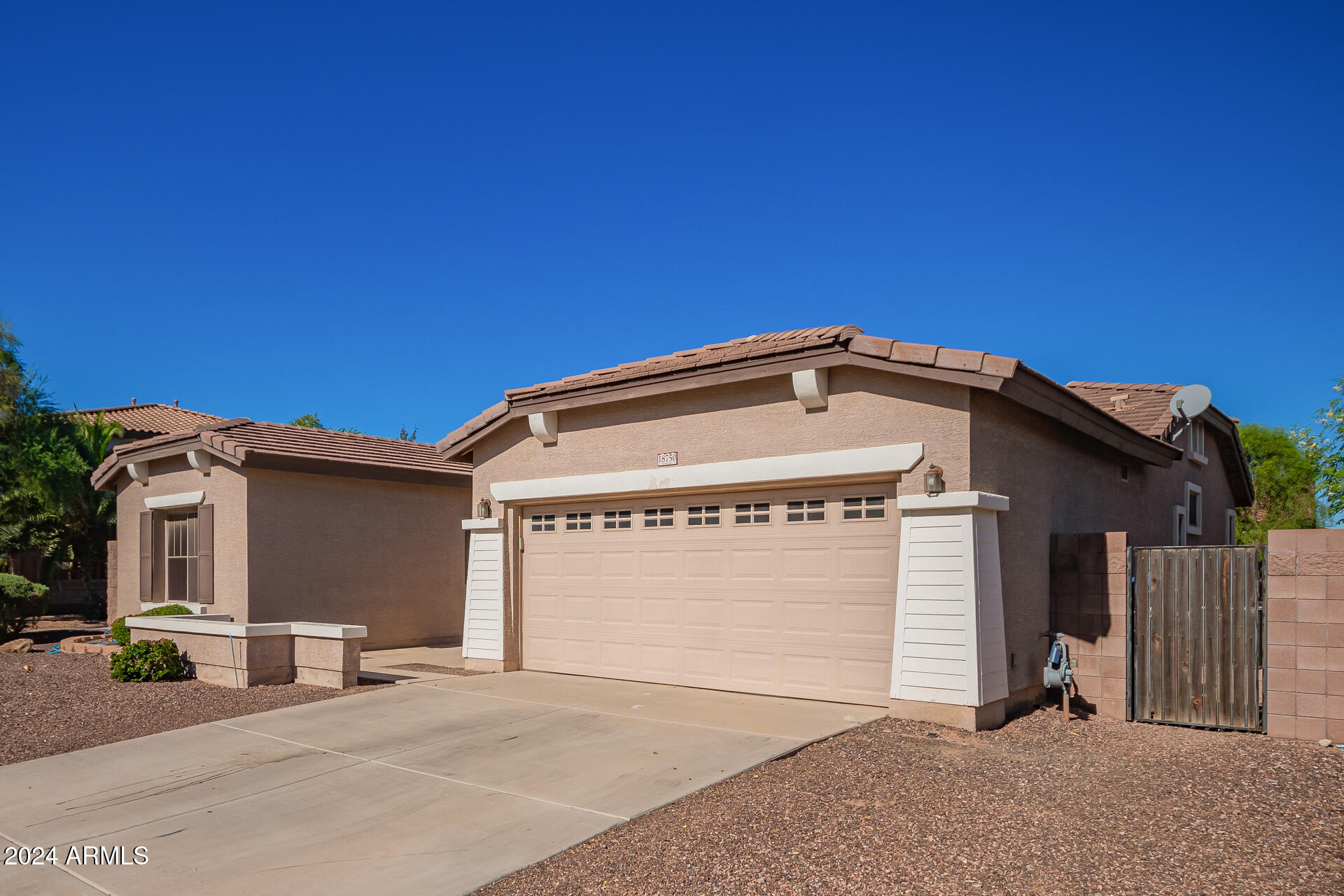 18750 East Ryan Road Queen Creek, AZ 85142 - Photo 3 of 36 a view of a house with a garage