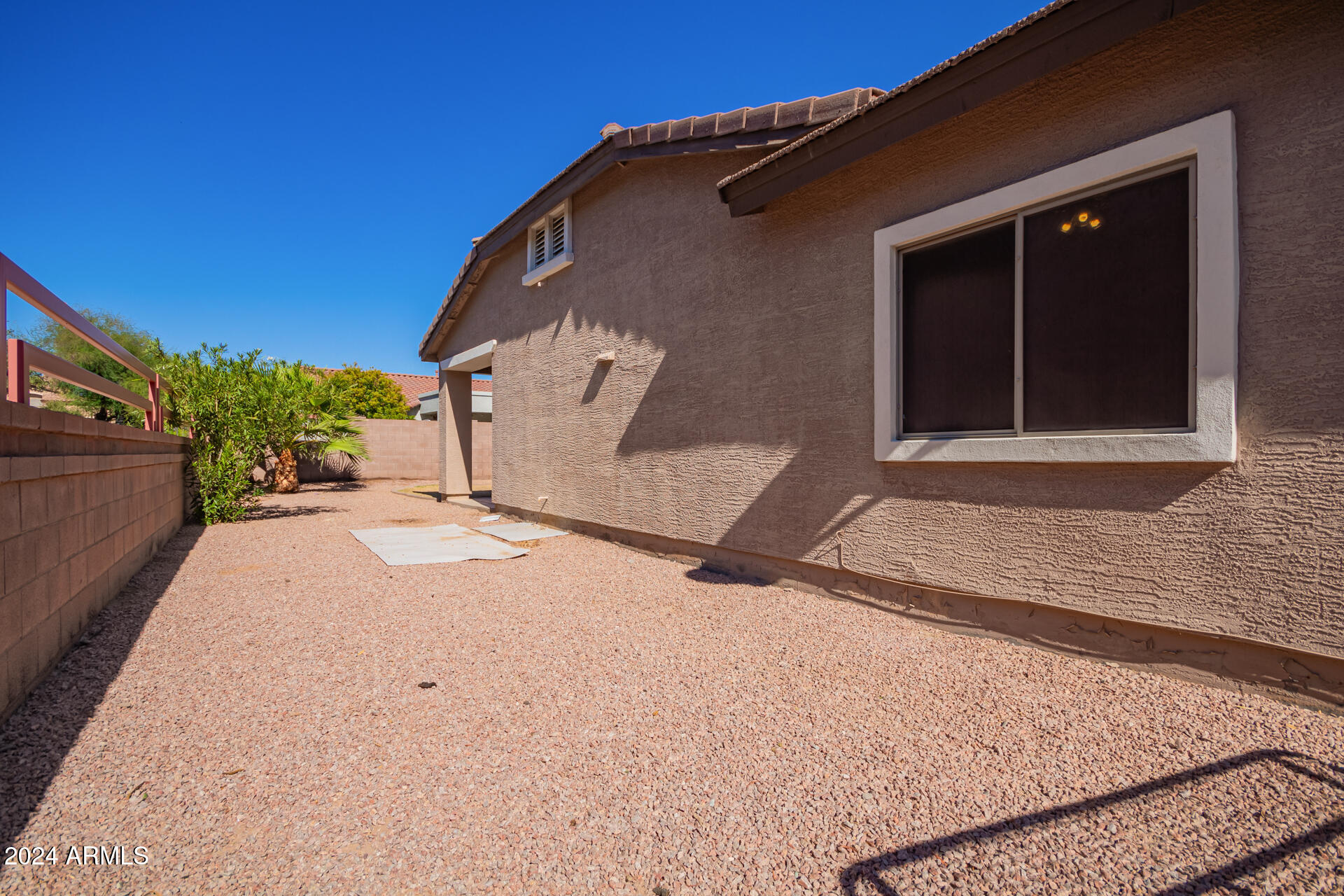 18750 East Ryan Road Queen Creek, AZ 85142 - Photo 35 of 36 a view of a house with a yard