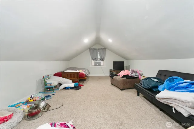 a living room with baby toys