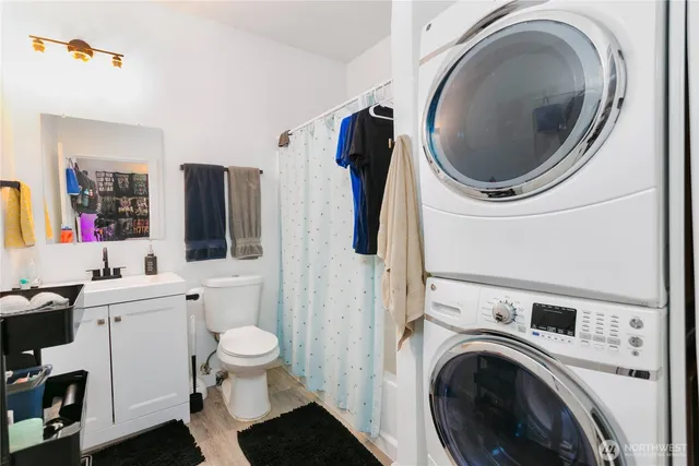 a kitchen with a washer and dryer