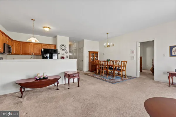 a living room with furniture and a table