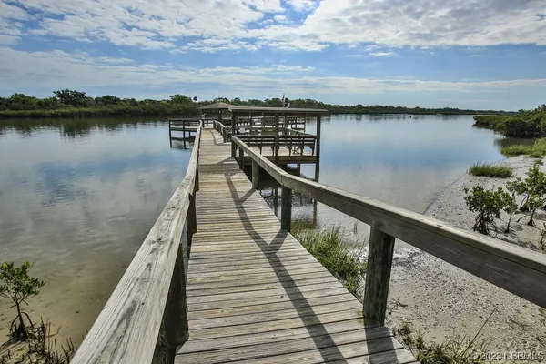 a view of a garden and trees
