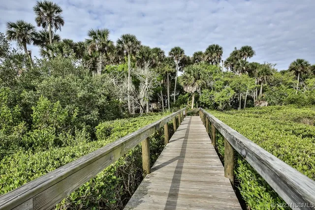 a view of a swimming pool with a sitting space