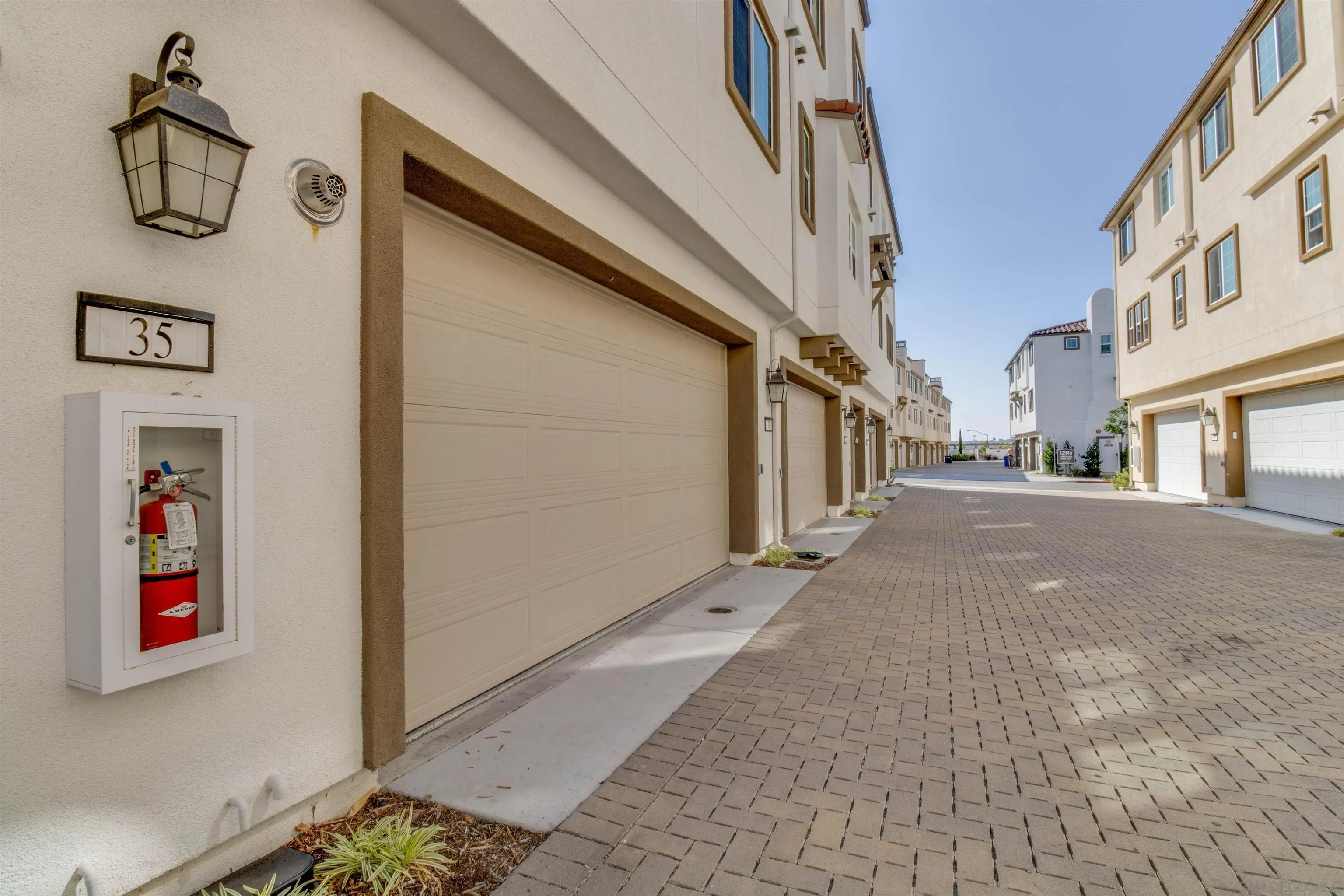 6012 Village Center Loop Road, Unit 35 San Diego, CA 92130 - Photo 27 of 29 a view of a street with paintings on the wall