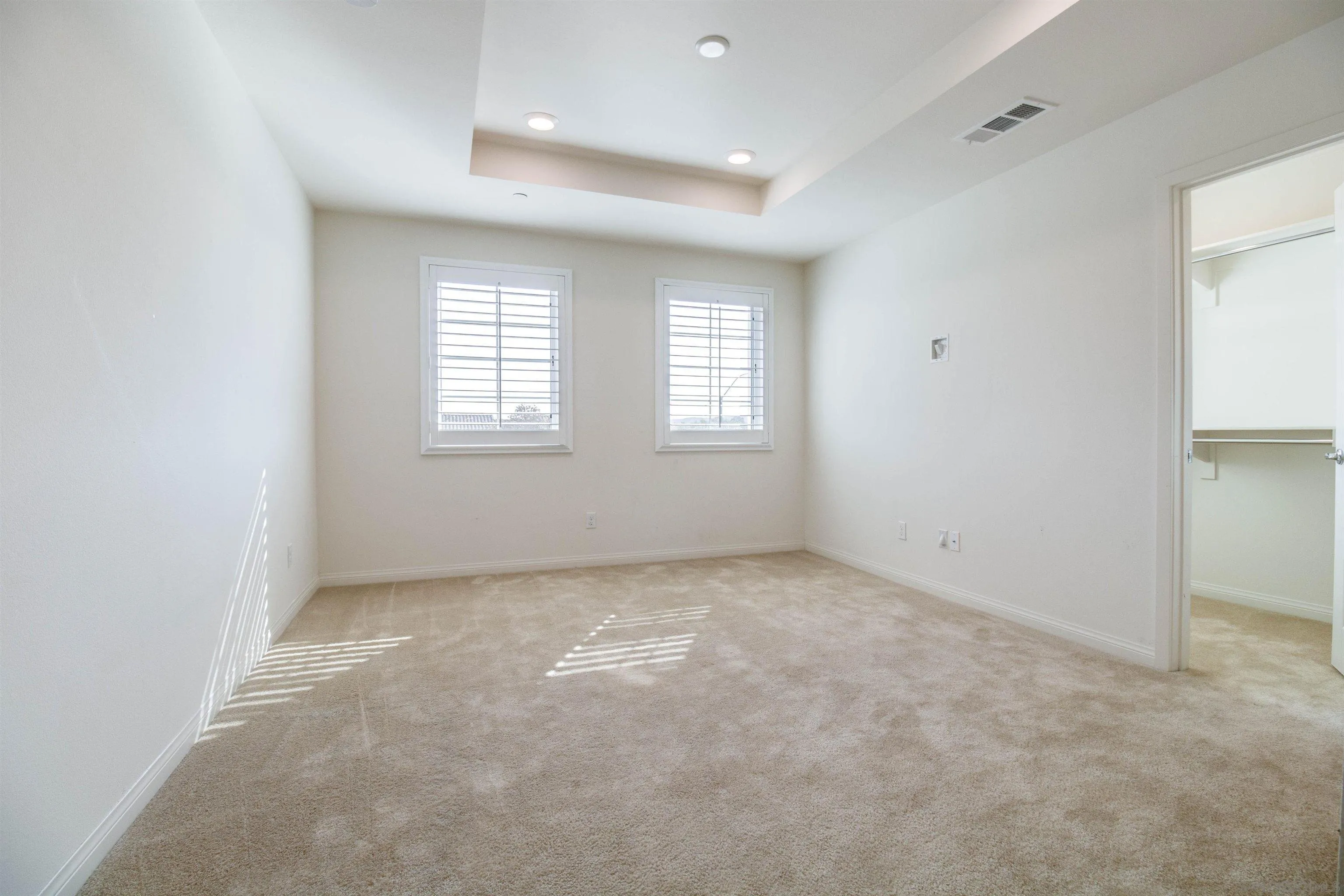 6012 Village Center Loop Road, Unit 35 San Diego, CA 92130 - Photo 10 of 29 an empty room with a window