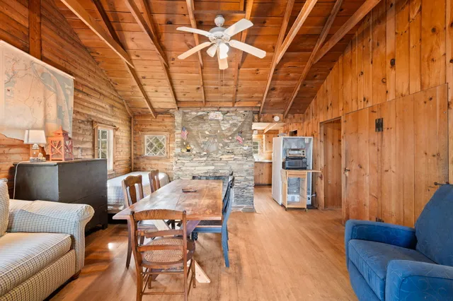 a view of a livingroom with furniture and a rug