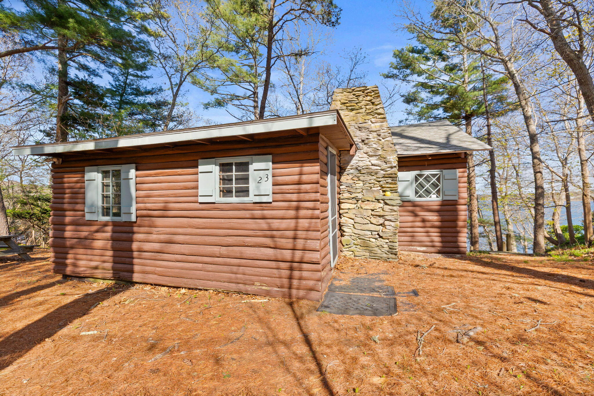 23 Pine Ridge Road Buzzards Bay, MA 02532 - Photo 4 of 27 a view of a house with a yard and garage