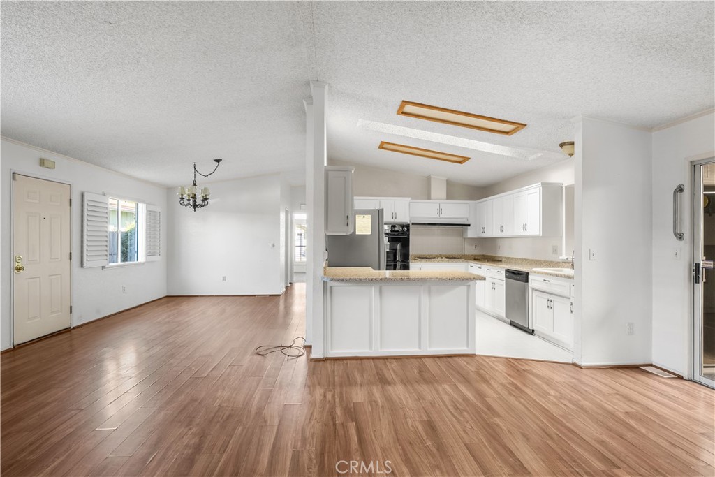820 Vista Del Rio Santa Maria, CA 93458 - Photo 10 of 57 a kitchen with stainless steel appliances granite countertop a refrigerator and a stove top oven
