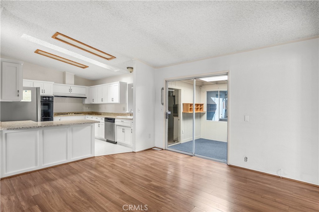 820 Vista Del Rio Santa Maria, CA 93458 - Photo 16 of 57 a view of a kitchen with wooden floor and a kitchen