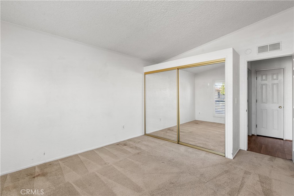 820 Vista Del Rio Santa Maria, CA 93458 - Photo 25 of 57 an empty room with sliding glass door
