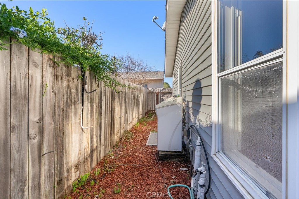 820 Vista Del Rio Santa Maria, CA 93458 - Photo 37 of 57 a view of a balcony with a potted plant and wooden fence