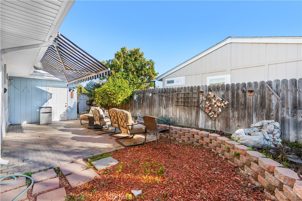 820 Vista Del Rio Santa Maria, CA 93458 - Photo 38 of 57 a backyard of a house with table and chairs
