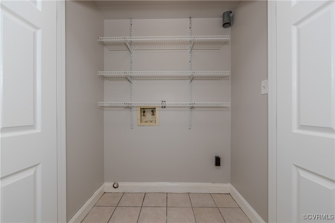 13817 Laurel Spring Road Chester, VA 23831 - Photo 24 of 40 Laundry area featuring light tile patterned floori