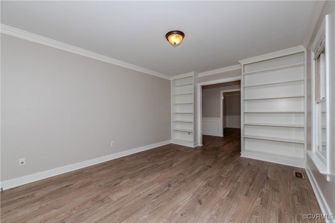 13817 Laurel Spring Road Chester, VA 23831 - Photo 3 of 40 Living room with built in cabinets featuring hardw