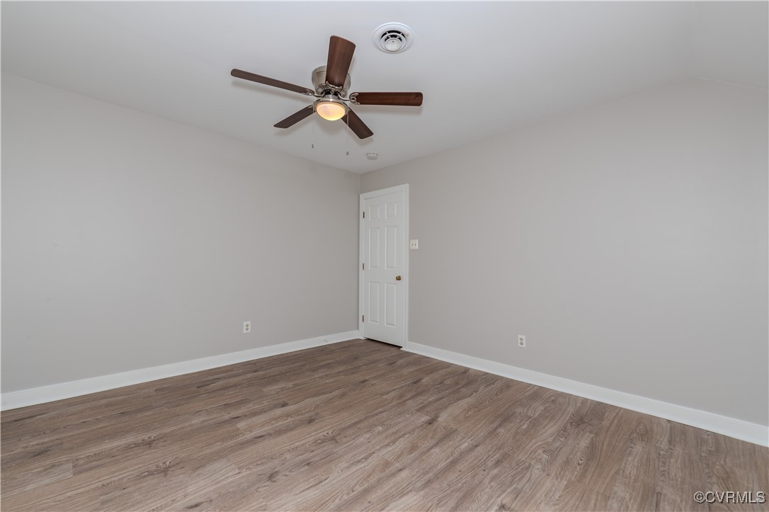 13817 Laurel Spring Road Chester, VA 23831 - Photo 31 of 40 Bedroom with light wood-type flooring and ceiling
