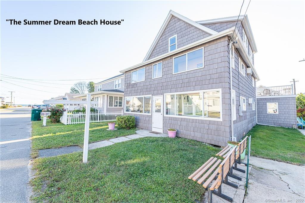 63 Old Colony Road Old Lyme, CT 06371 - Photo 1 of 1 a view of a house with a yard and sitting area