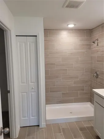 a bathroom with a bathtub