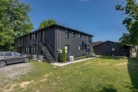 a room with a bed and a view in closet
