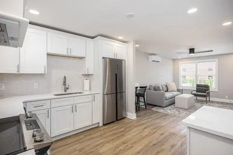 a view of a house with swimming pool