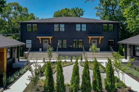 front view of a house with a swimming pool