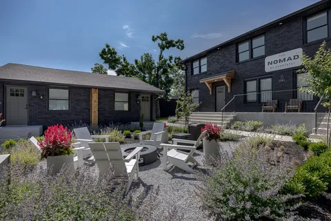 a backyard of a house with lots of green space