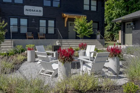 a bedroom with a bed and a view of bedroom