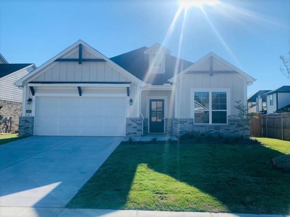 906 Gambel Drive Sherman, TX 75092 - Photo 1 of 26 a view of a front of house with a yard