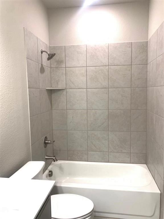 906 Gambel Drive Sherman, TX 75092 - Photo 20 of 26 a bathroom with a sink toilet and shower