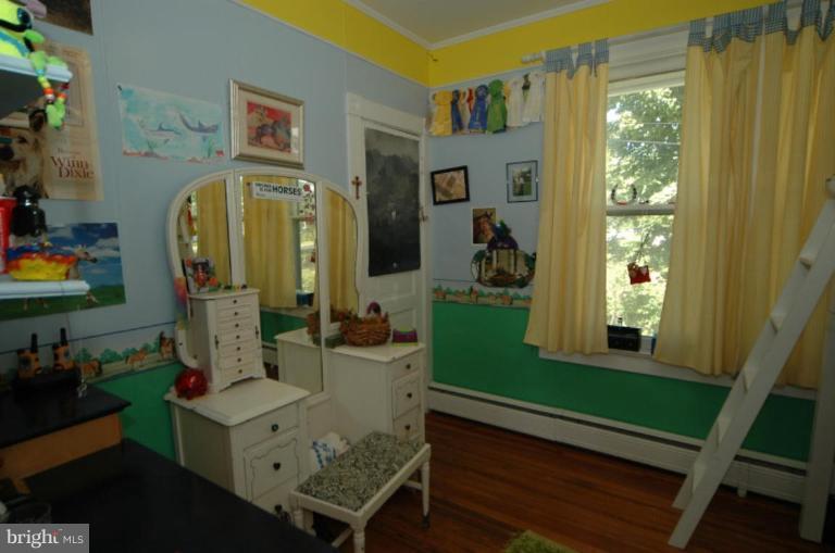 113 Morven Park Road Northwest Leesburg, VA 20176 - Photo 7 of 16 a view of living room filled with furniture and a large window