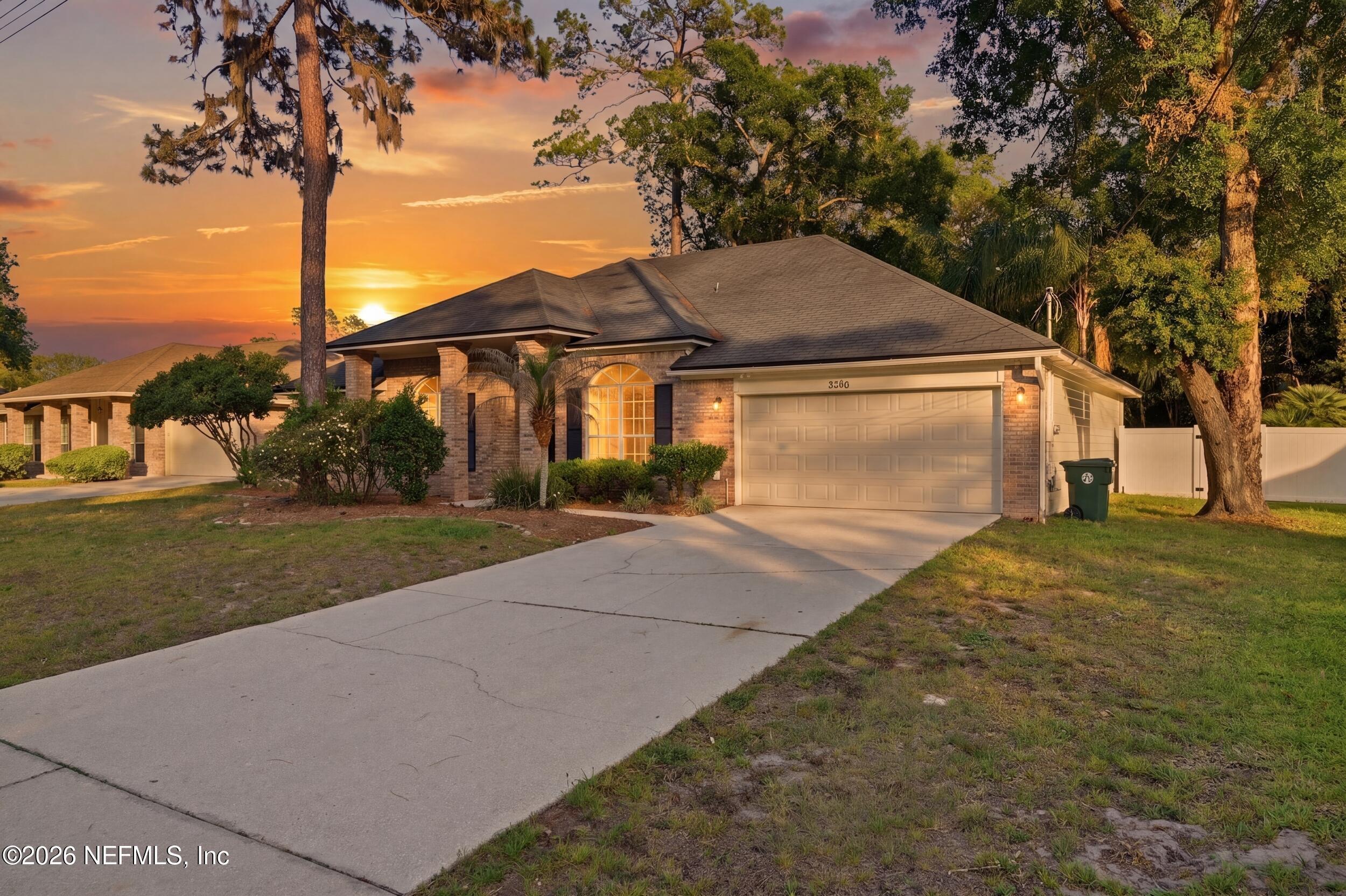 3286 Marbon Road Jacksonville, FL 32223 - Photo 2 of 36 a backyard of a house with lots of green space