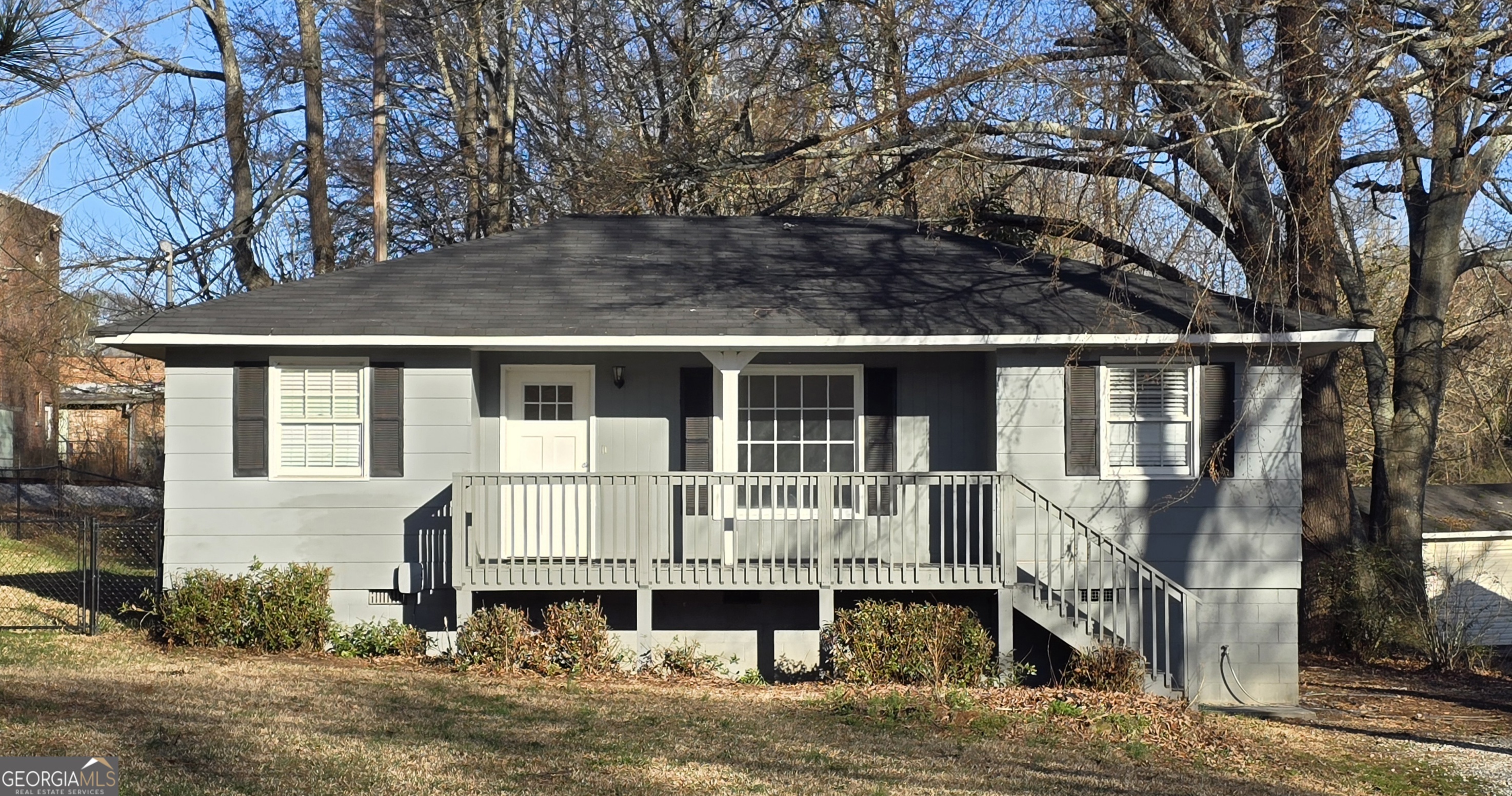 71 Railroad Avenue Jefferson, GA 30549 - Photo 1 of 1 a front view of a house with garden