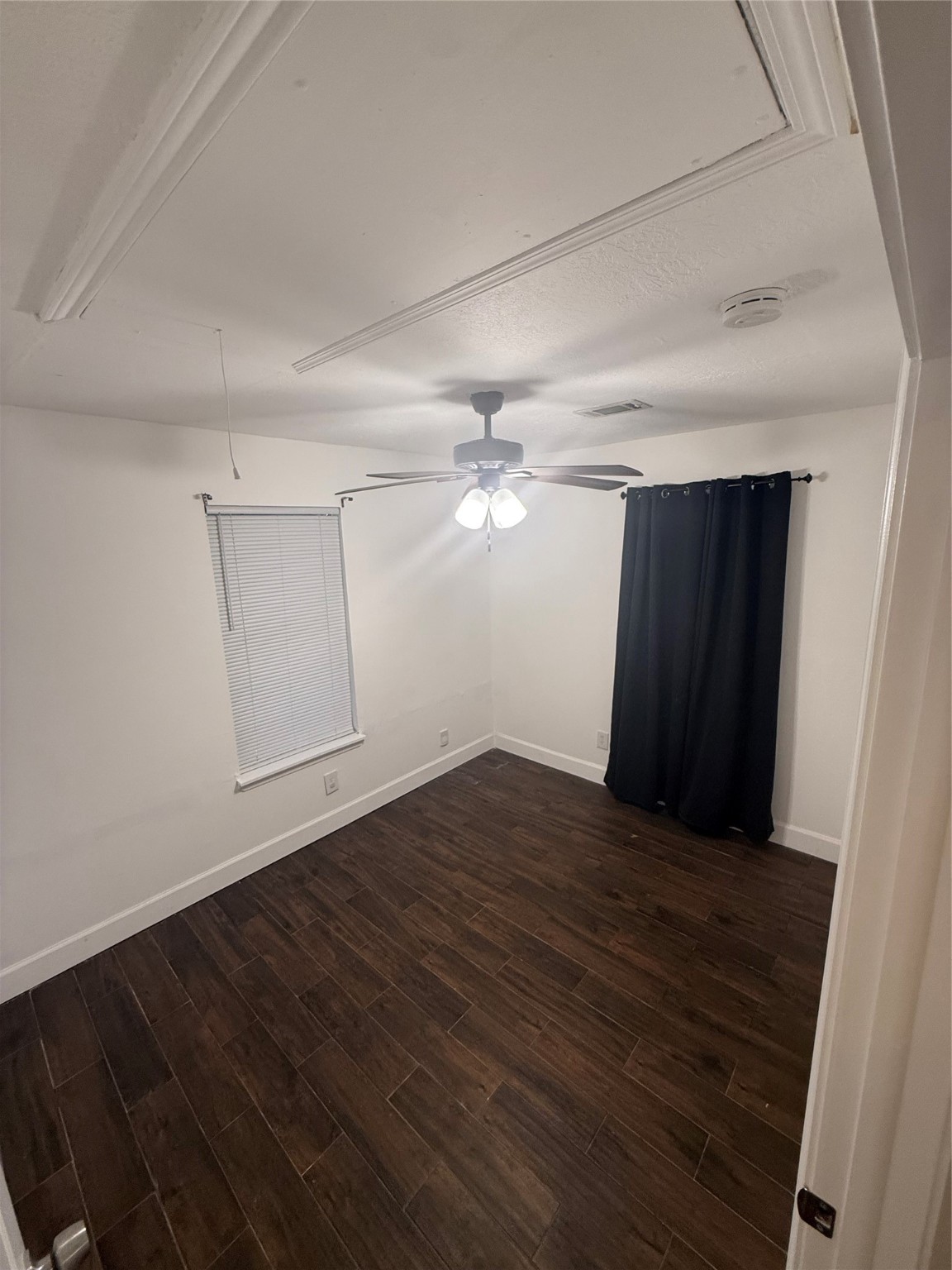 919 Lovett Street Tomball, TX 77375 - Photo 11 of 21 wooden floor in an empty room