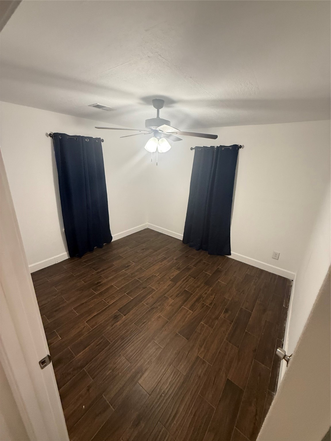 919 Lovett Street Tomball, TX 77375 - Photo 12 of 21 a bedroom with a bed