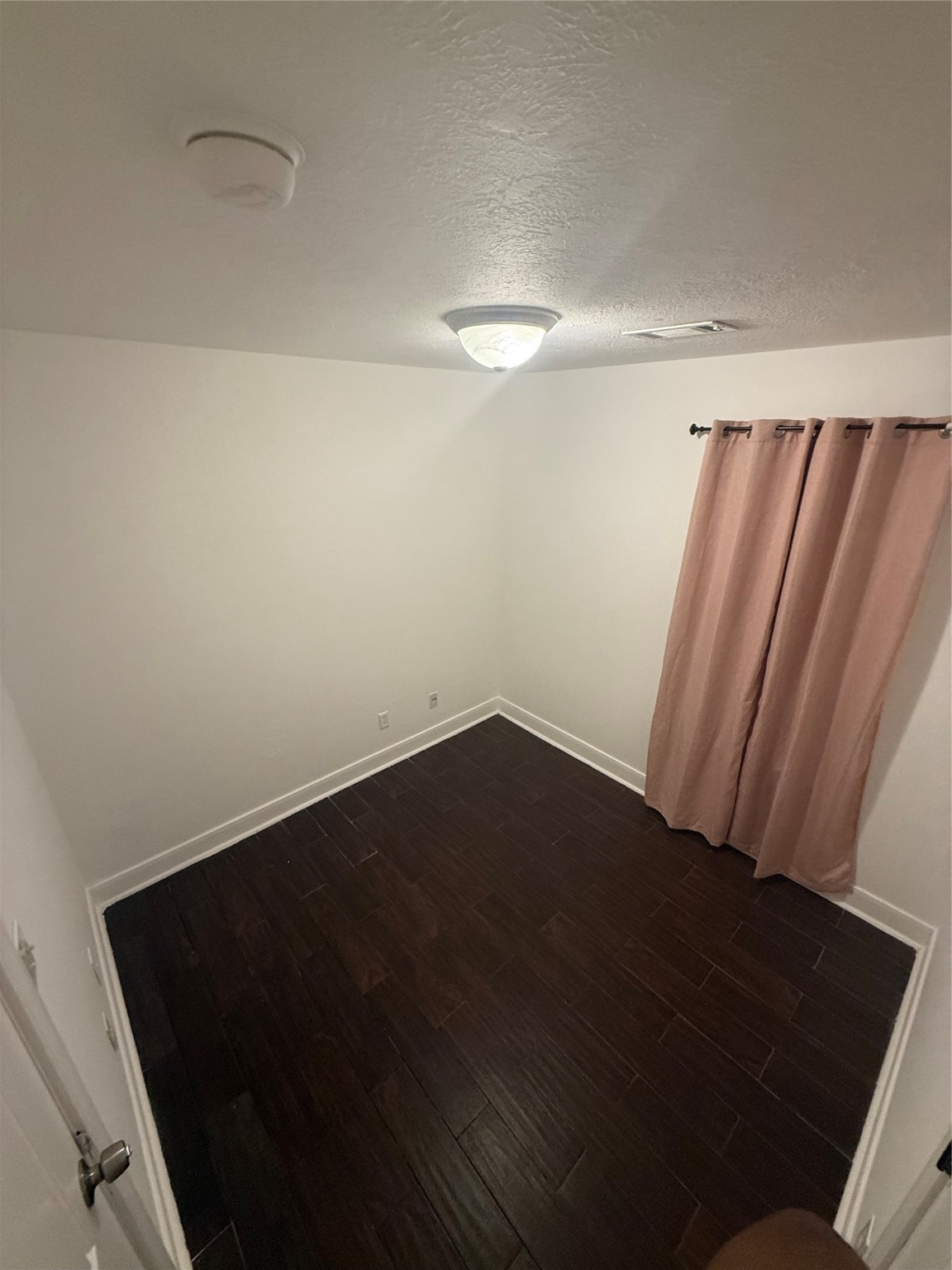919 Lovett Street Tomball, TX 77375 - Photo 21 of 21 a view of a closet area with hardwood floor
