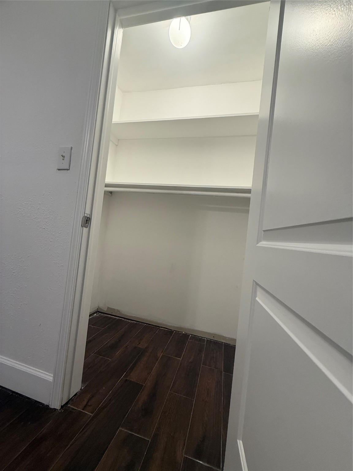 919 Lovett Street Tomball, TX 77375 - Photo 10 of 21 a view of storage and utility room with empty racks