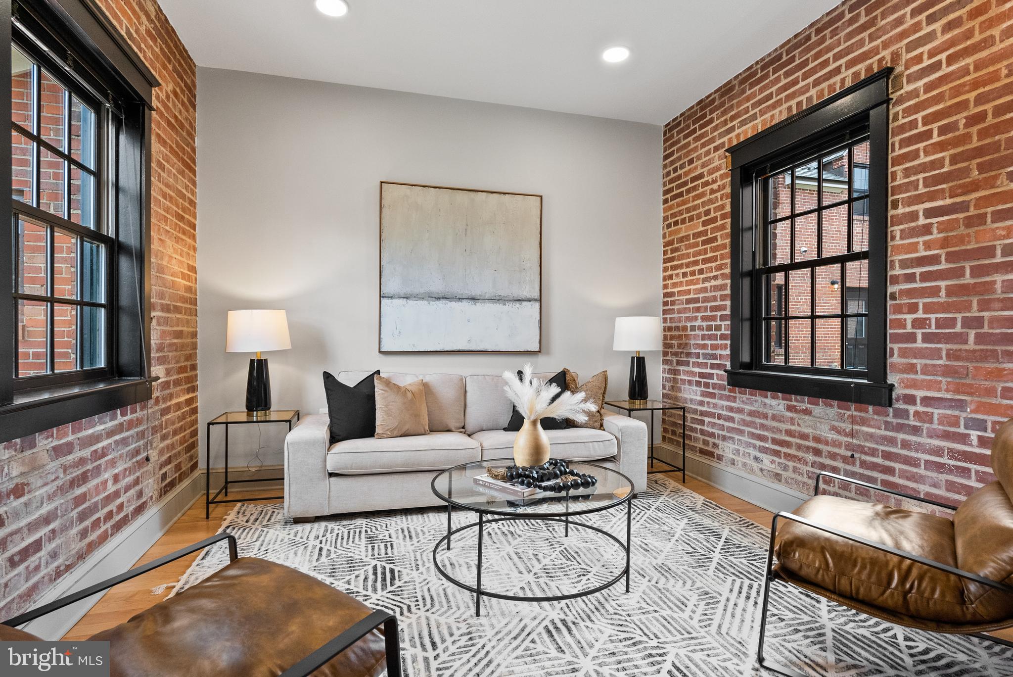 9071 Power House Road, Unit 102 Lorton, VA 22079 - Photo 13 of 53 a living room with furniture fireplace and a window
