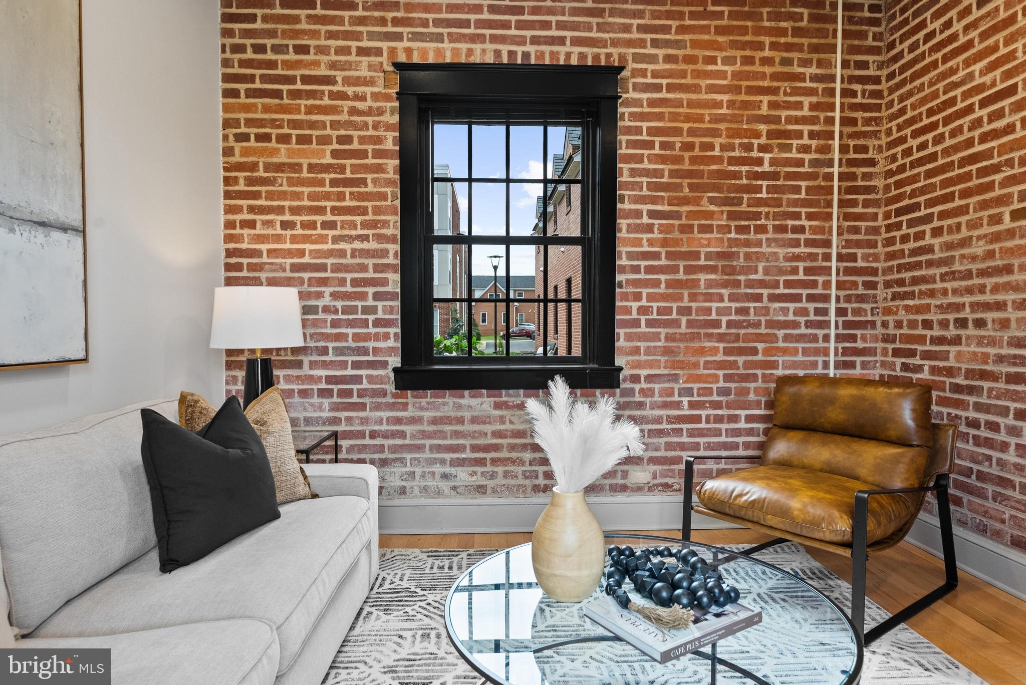 9071 Power House Road, Unit 102 Lorton, VA 22079 - Photo 14 of 53 a living room with furniture and a window
