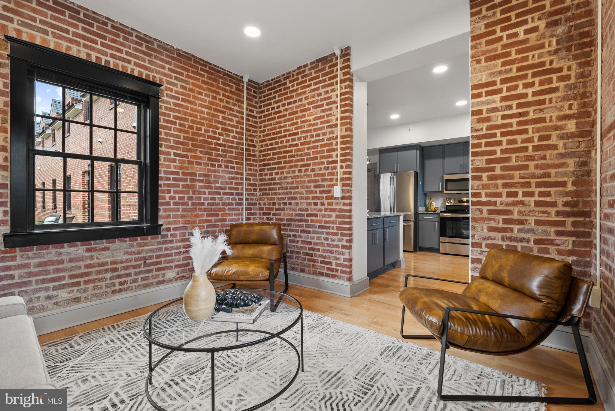 9071 Power House Road, Unit 102 Lorton, VA 22079 - Photo 15 of 53 a workspace room with furniture and windows