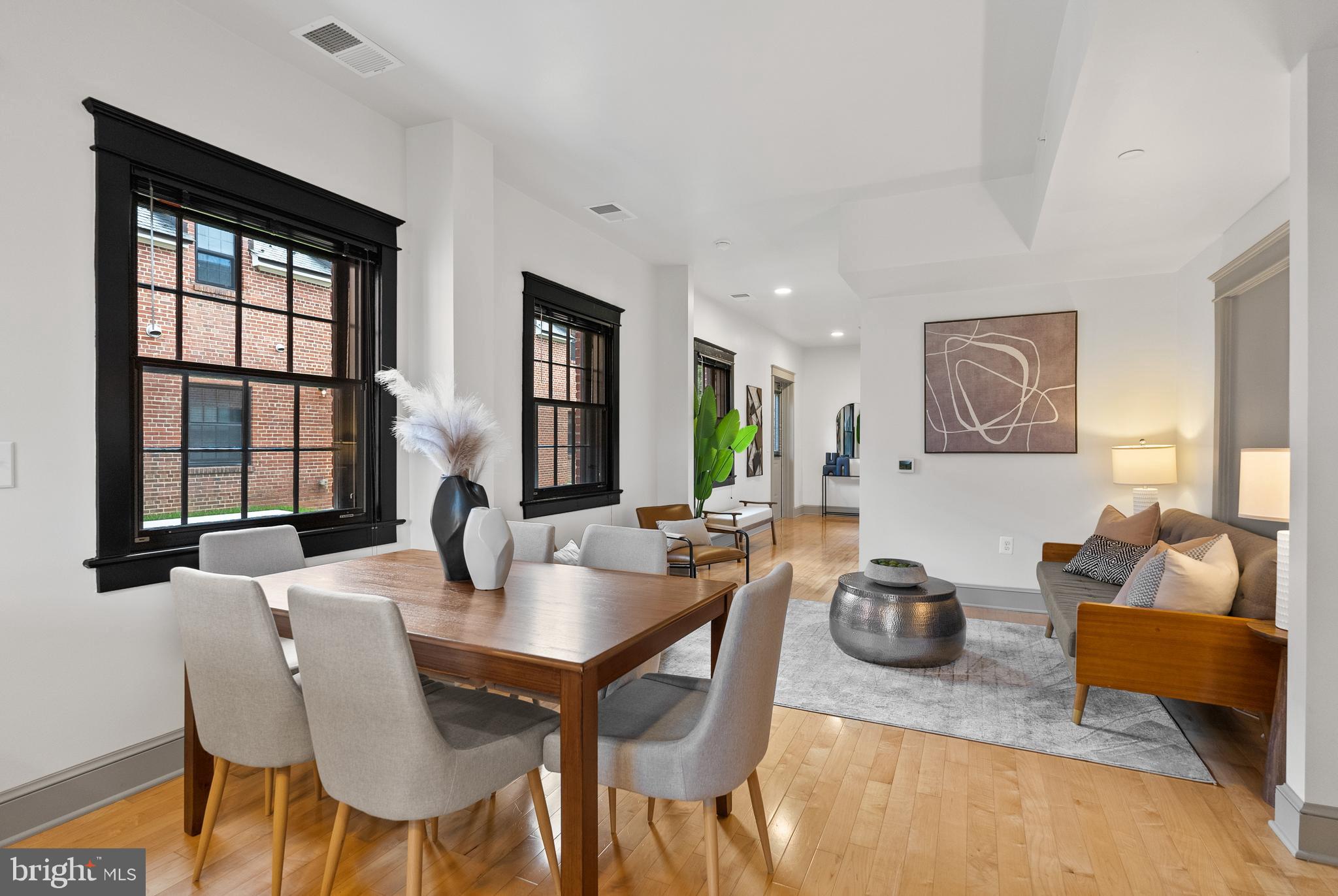 9071 Power House Road, Unit 102 Lorton, VA 22079 - Photo 18 of 53 a view of a dining room with furniture and window