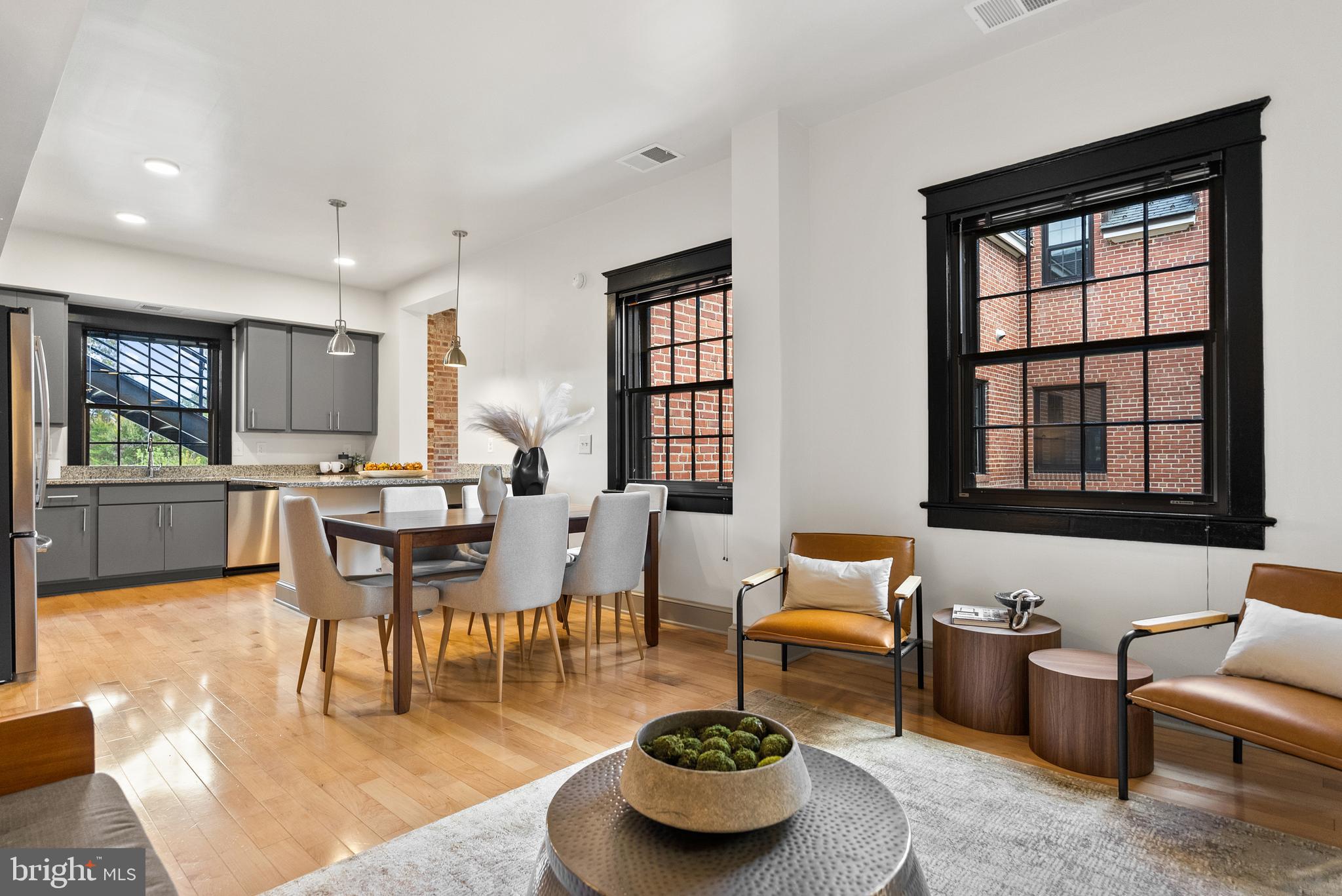 9071 Power House Road, Unit 102 Lorton, VA 22079 - Photo 20 of 53 a living room with furniture and a large window