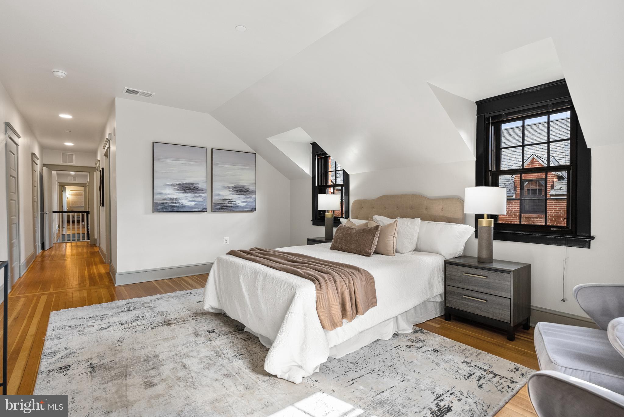 9071 Power House Road, Unit 102 Lorton, VA 22079 - Photo 32 of 53 a bedroom with a bed couch and window