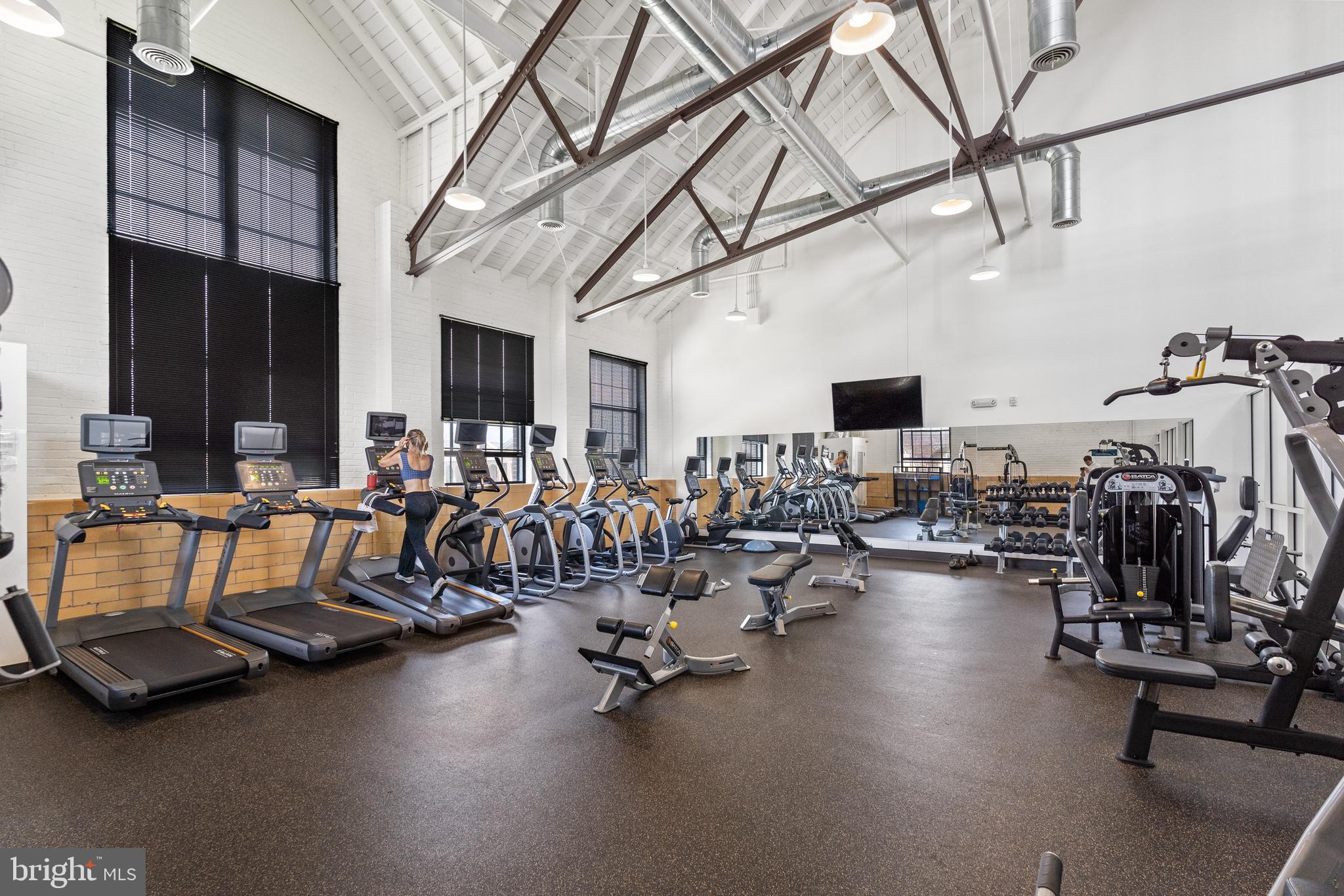 9071 Power House Road, Unit 102 Lorton, VA 22079 - Photo 44 of 53 a view of a room with gym equipment