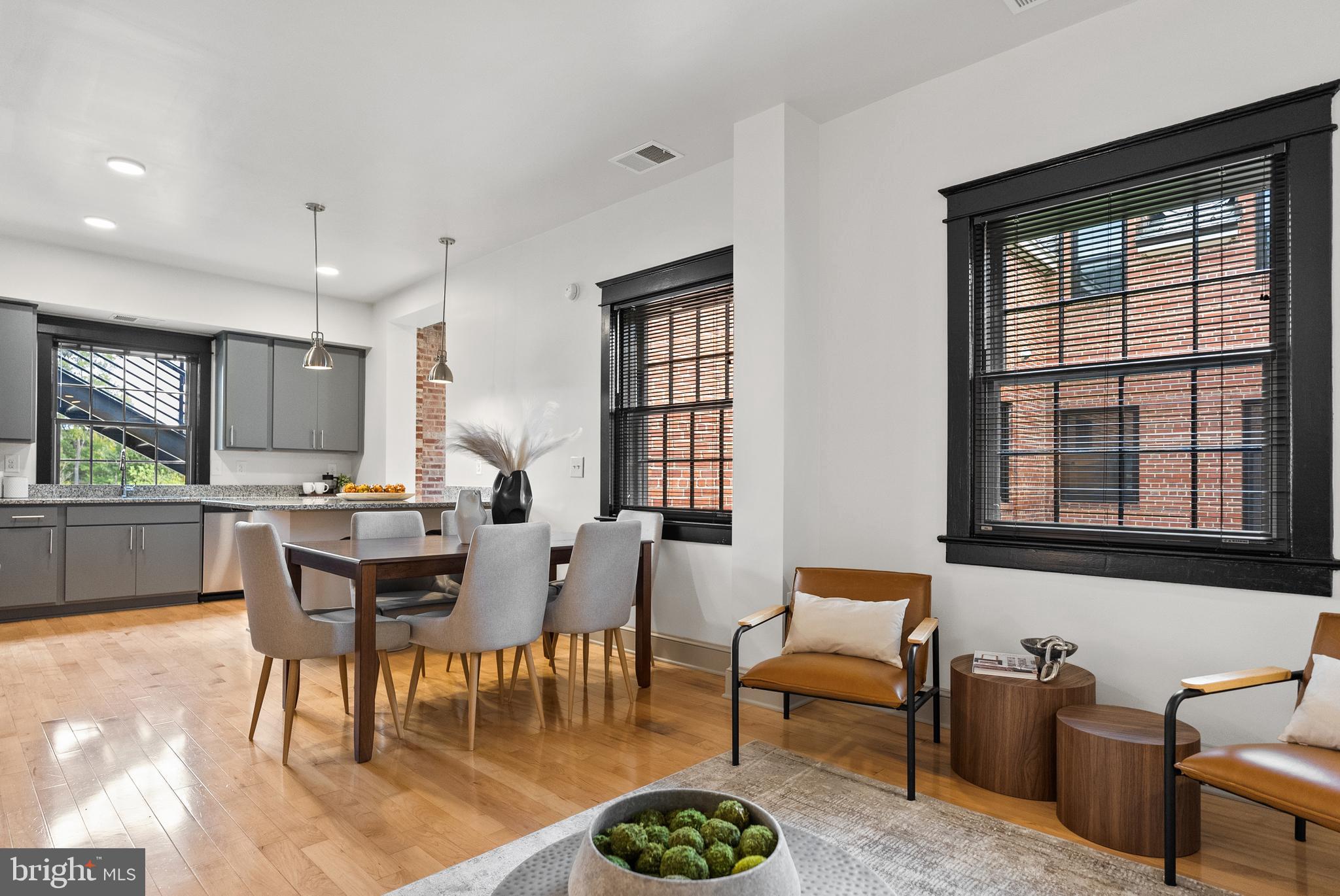9071 Power House Road, Unit 102 Lorton, VA 22079 - Photo 8 of 53 a view of a dining room with furniture