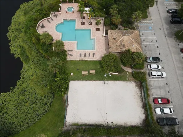 an aerial view of a house with outdoor space