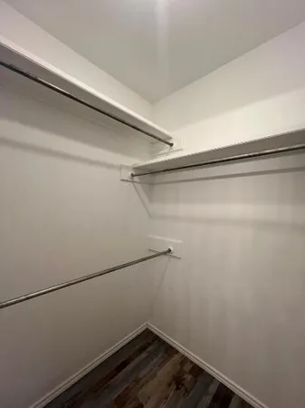 a view of a room with racks on the wall