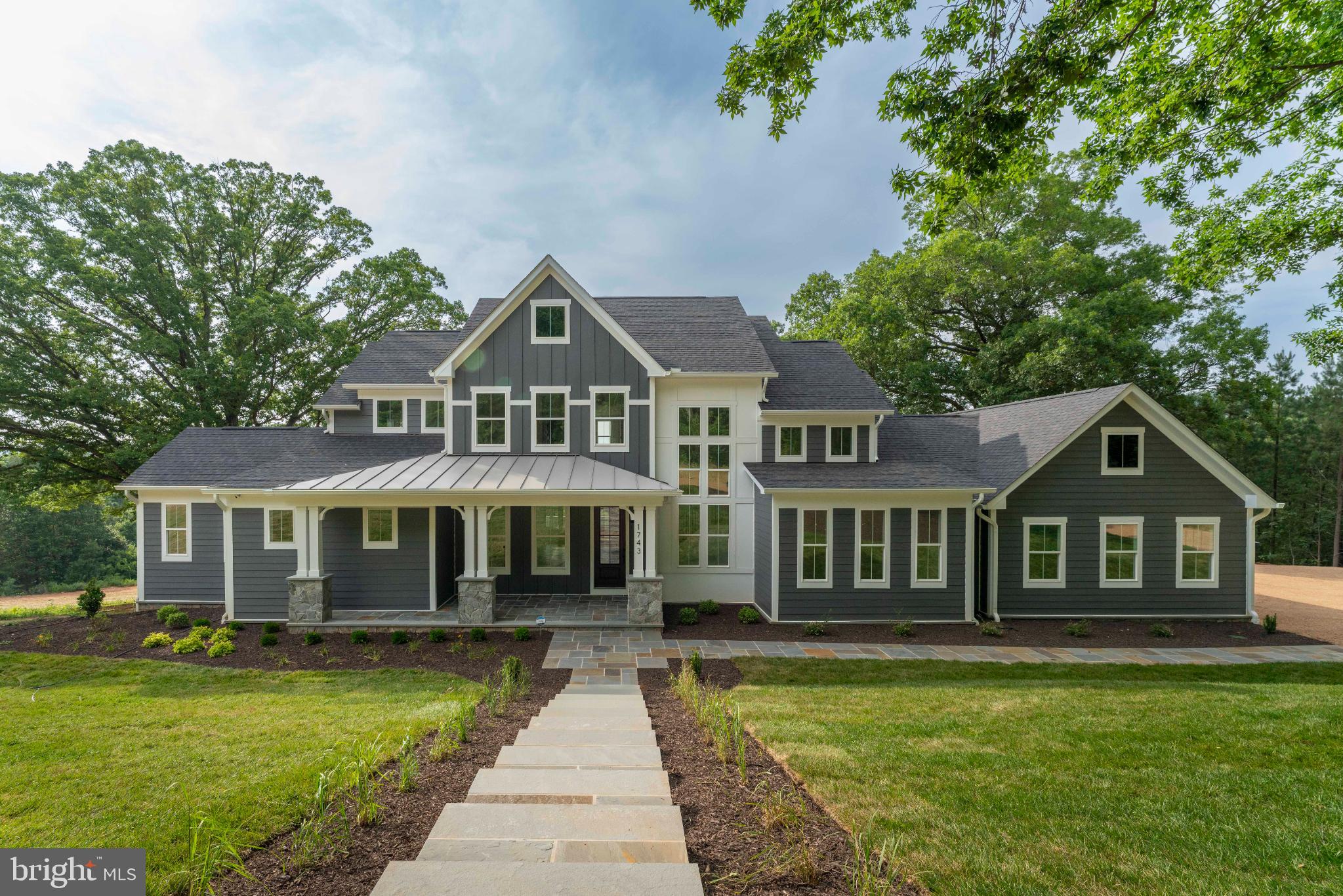 623 Traveller Court Lothian, MD 20711 - Photo 1 of 76 Elegant modern home with lush surroundings.