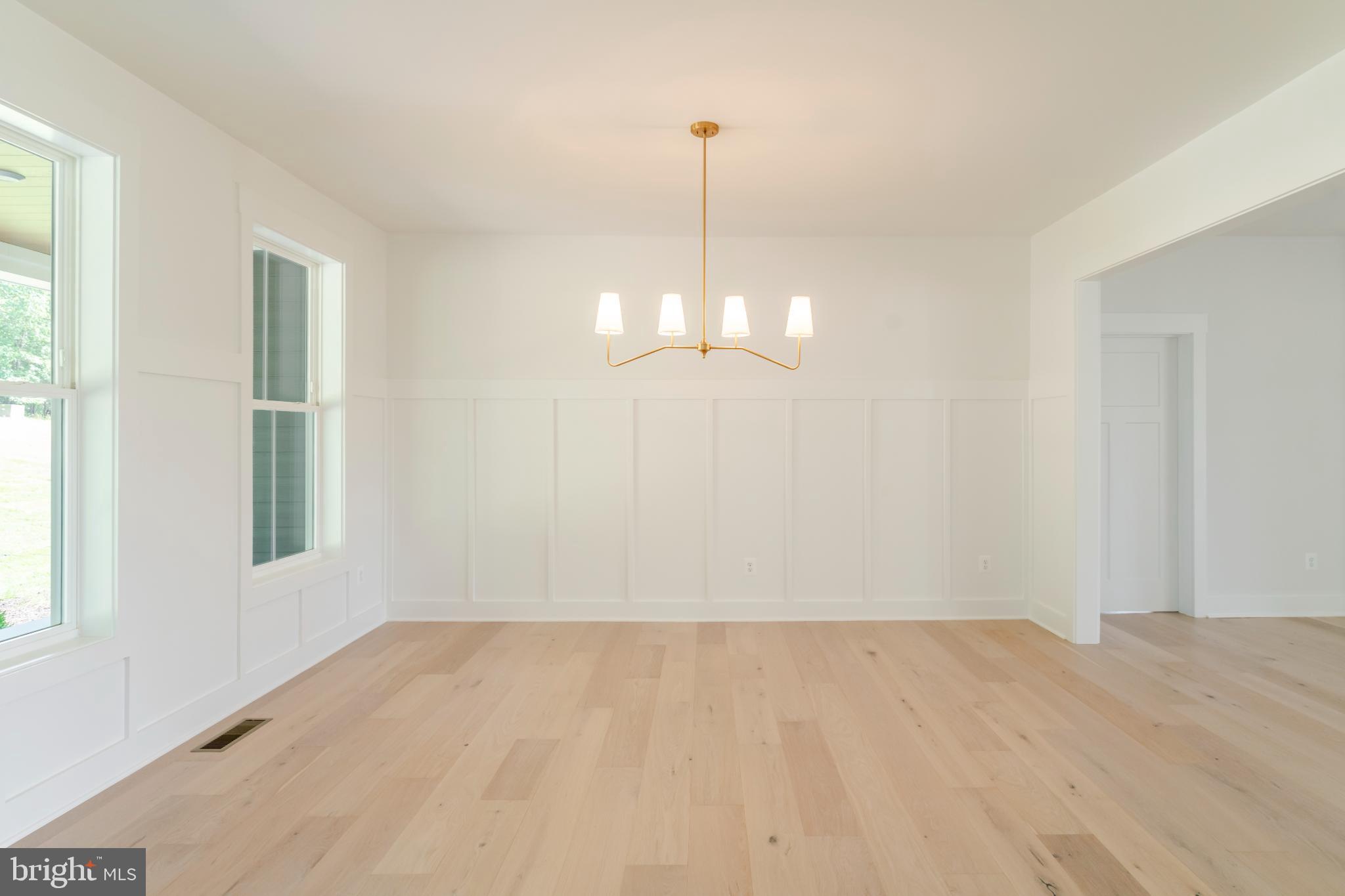 623 Traveller Court Lothian, MD 20711 - Photo 16 of 76 Bright and airy space with elegant lighting.