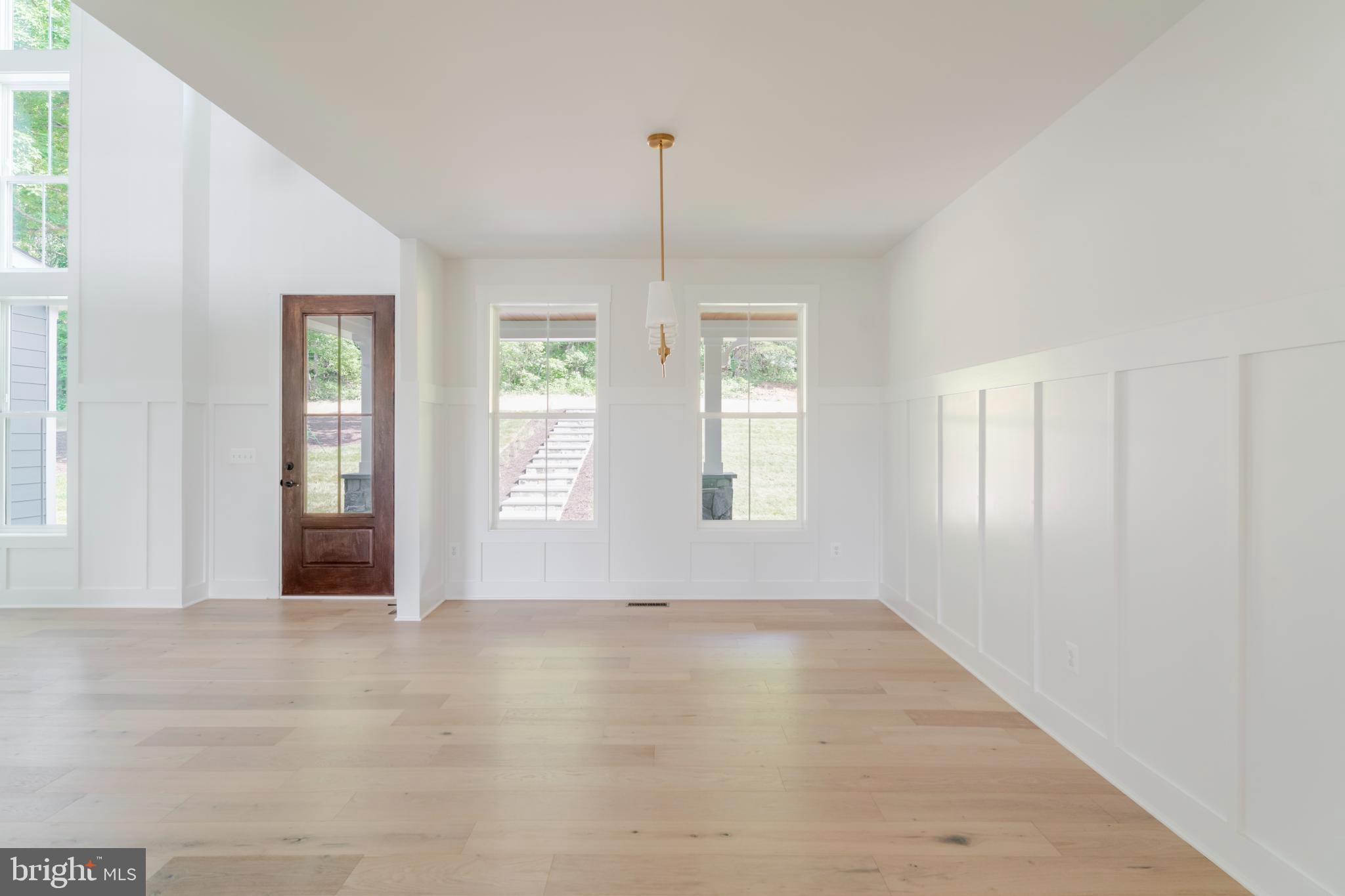 623 Traveller Court Lothian, MD 20711 - Photo 18 of 76 Bright, airy space with elegant simplicity.