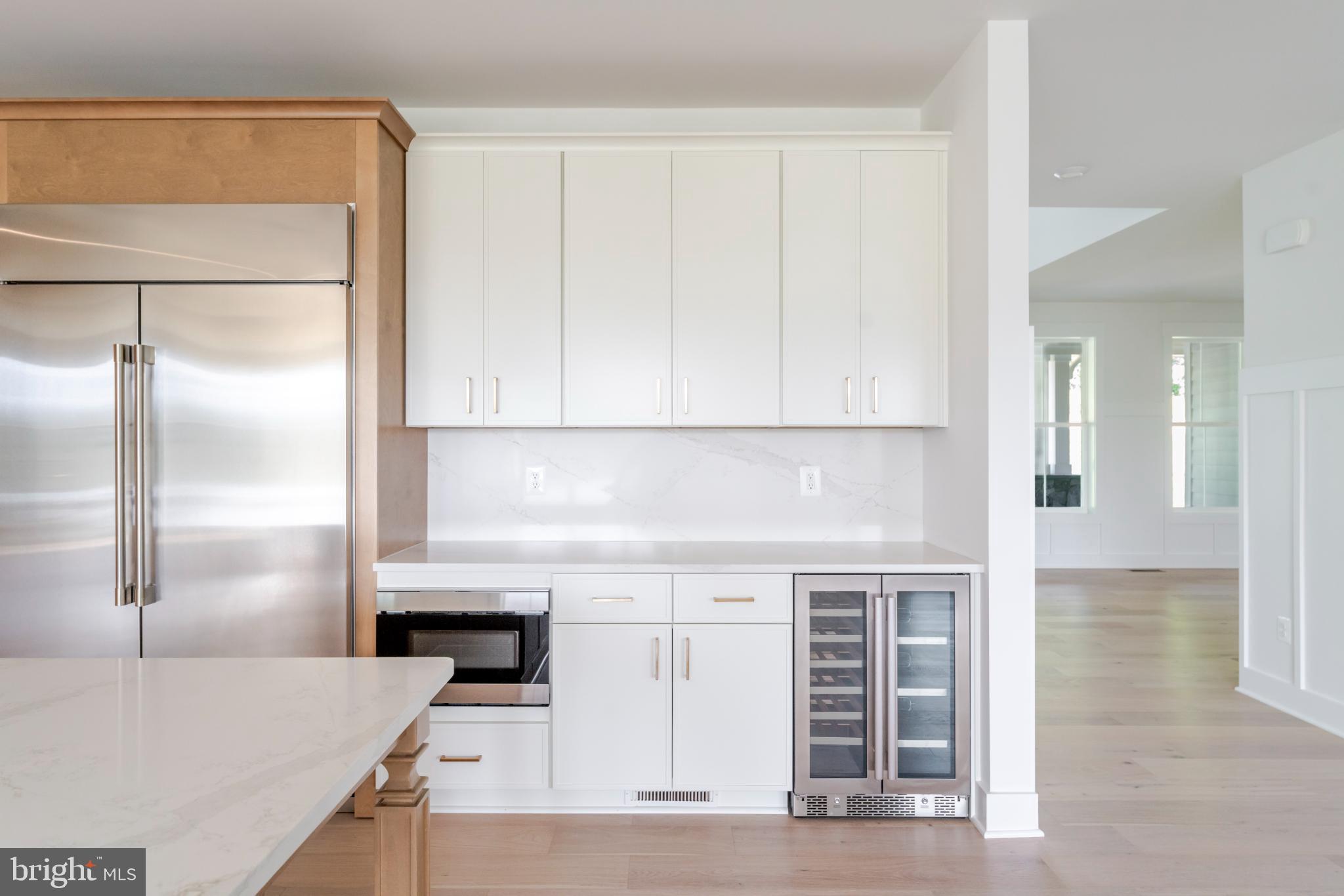623 Traveller Court Lothian, MD 20711 - Photo 23 of 76 Sleek modern kitchen with elegant finishes.